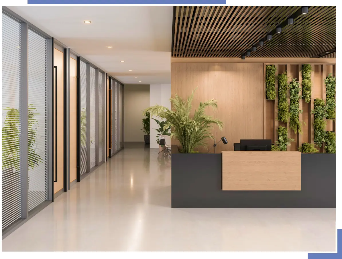 Modern office reception with plants and wood.